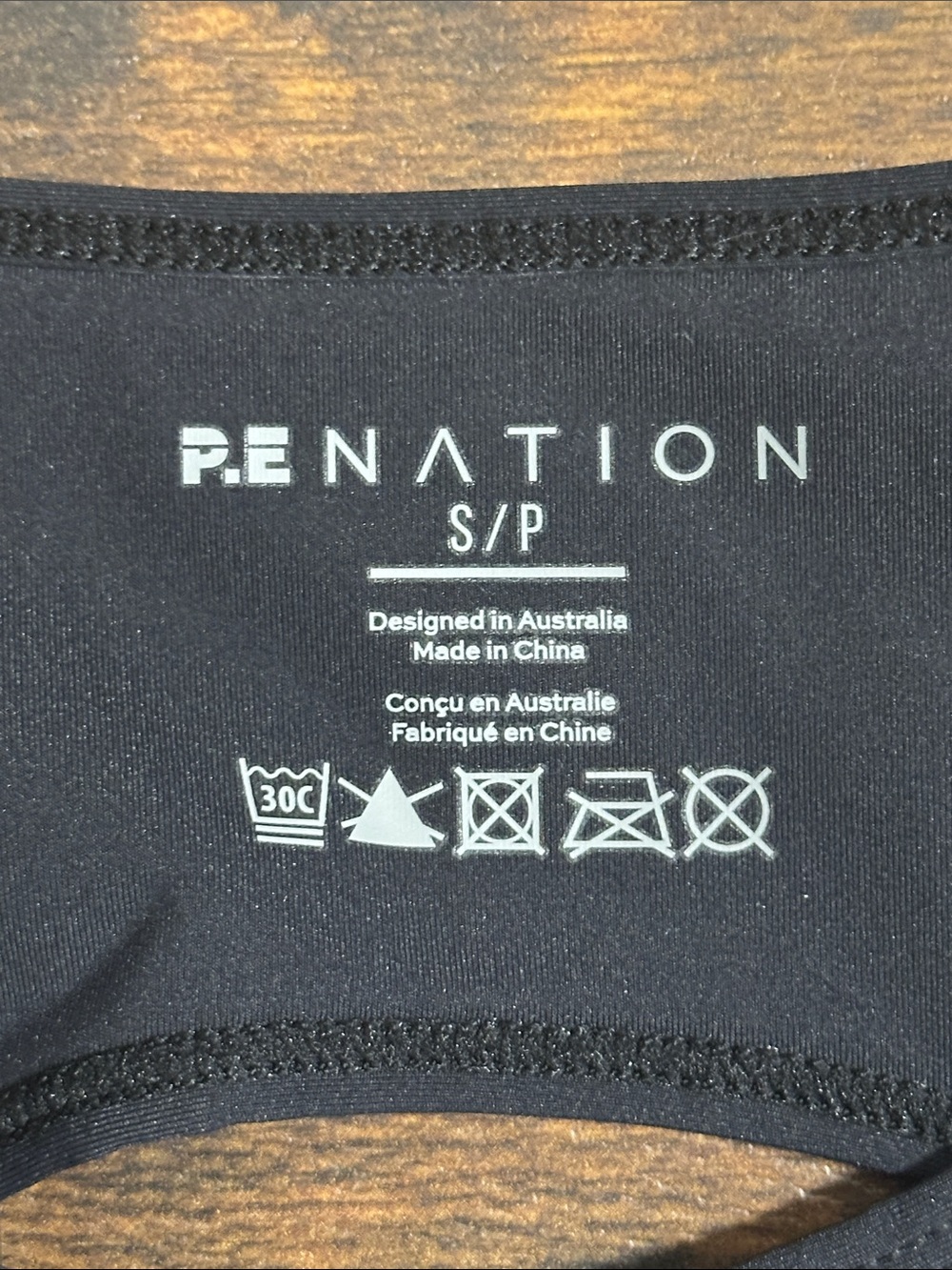 🦋P.E Nation Black Crop Tank with Tan Branded Band and Light Blue Logo🖤💙 - Picture 2 of 8